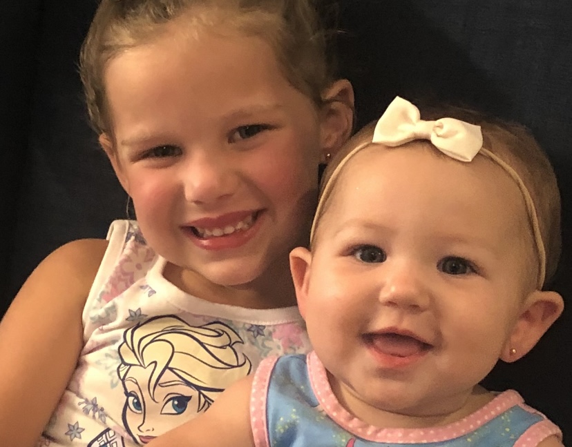 Happy customers after ear piercing at Canopy Pediatrics
